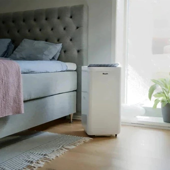 Woods Milan 9K Air Conditioner shown in bedroom situation from Bright Air portable air con in white